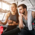 Image of two gym members using the top gym software