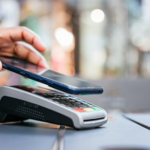 Image of payment processing trends tap to pay card