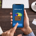 Image of a digital wallet payment via a mobile phone